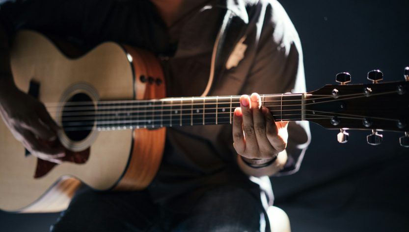 person playing guitar