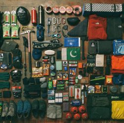 assorted items on black textile