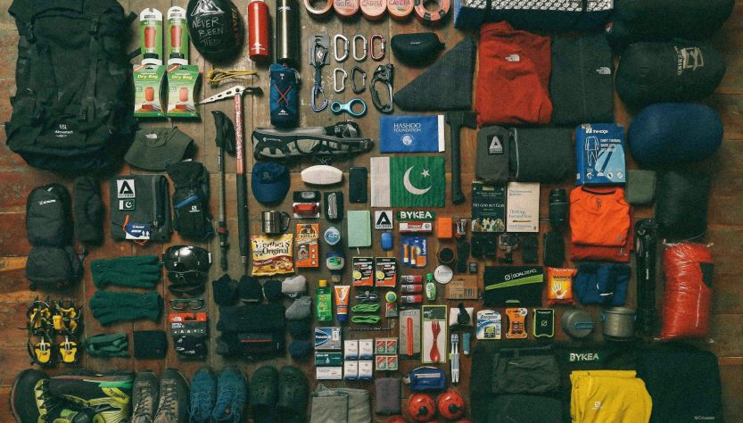assorted items on black textile